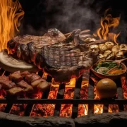 Foto de um churrasco assando, precisamos reduzir consumo de carne