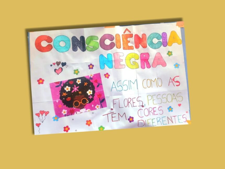 Cartaz sobre a consciência negra feita por alunos pequenos da ACM/POA